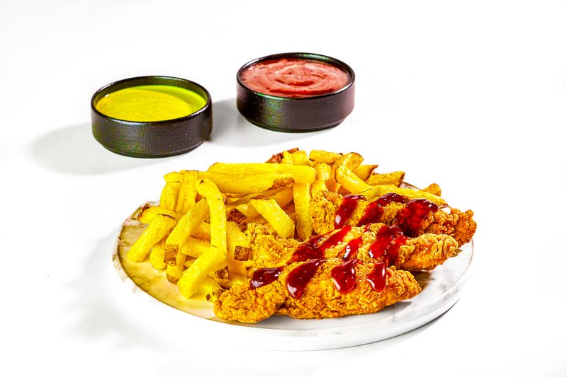 Buffalo wings starter with dipping sauce at Pizza inn